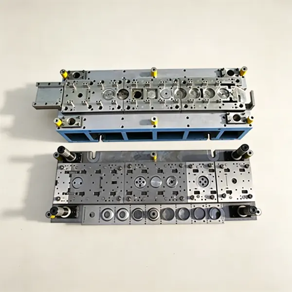 progressive die for motor housing